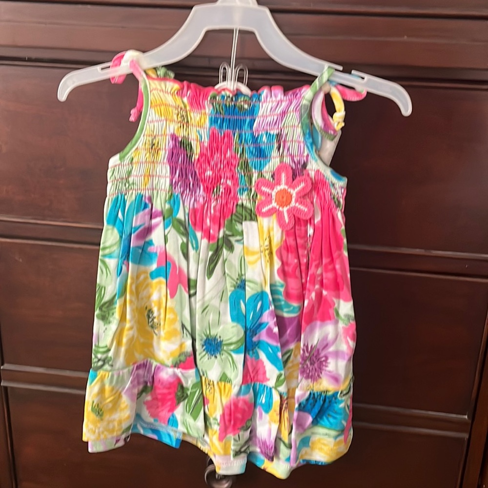 Pretty spring dress with crochet flower